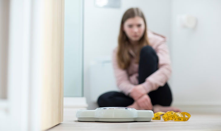 A female teen is concerned with the digit the scale displayed despite being at the perfect weight. Is clear need of therapy here at Clearfork Academy.