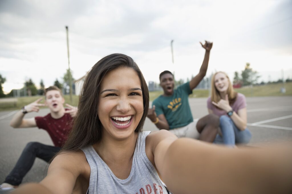 A group of teens with high self-esteem enjoying school; are all alumni here at Clearfork Academy.