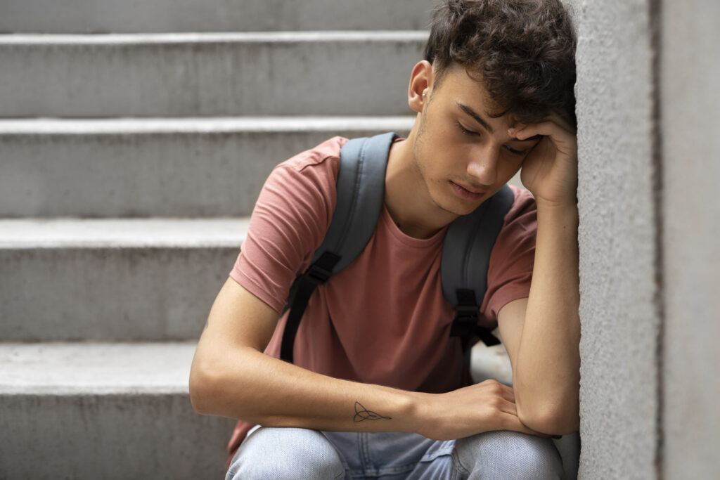 A male teen displaying unusual behavior; is in clear need of outpatient rehab. 