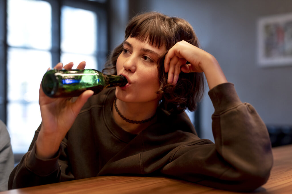 A female teen drinking alcohol; is in clear need of alcohol detox here at Clearfork Academy. 