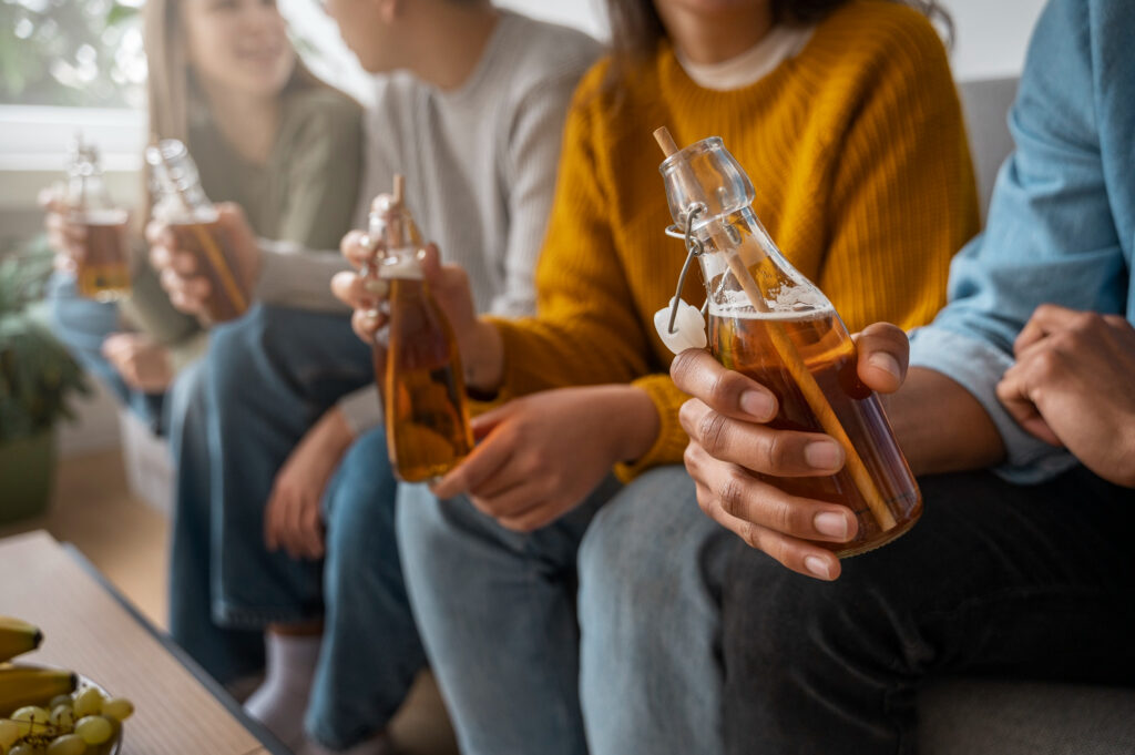 A group of teens engaging in drinking activities; parents should be concerned.