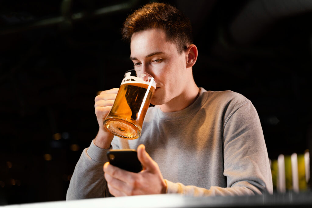 A male teen drinking a pint after school hours; is in need of treatment.
