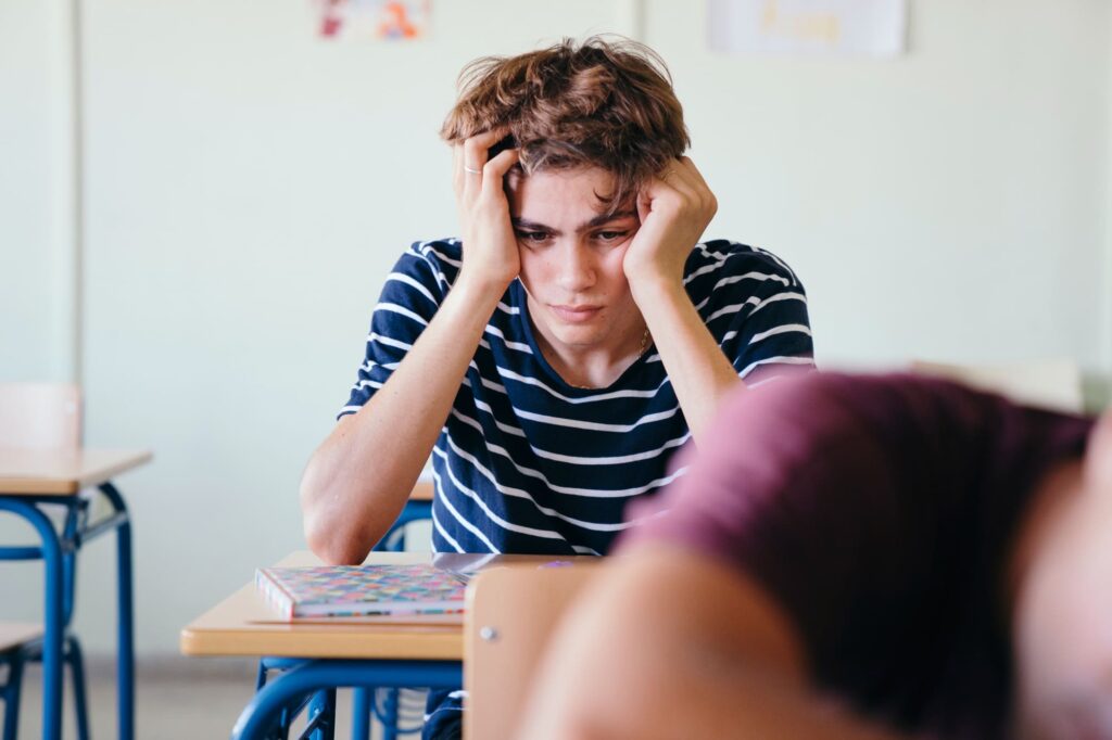 A male teen is frustrated as he is not seeing the same success in college; and is suffering from drug addiction.