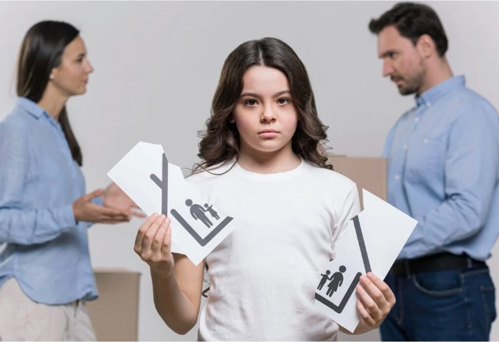 A teenager ripping a piece of paper, signifying separation, while her parents argue in the background