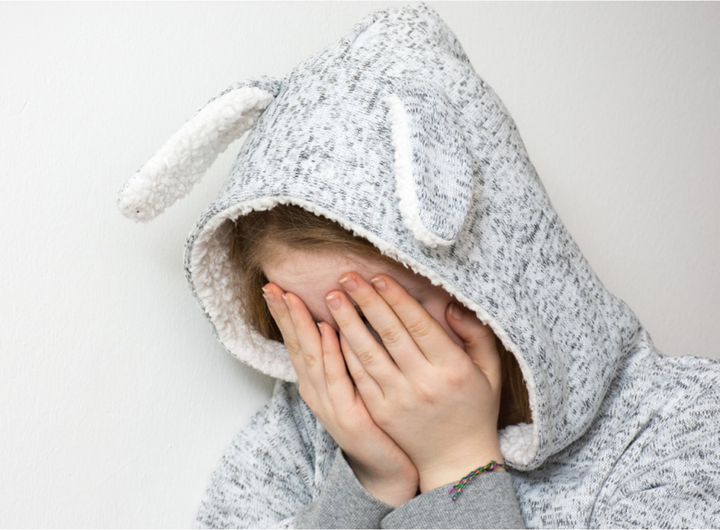 A troubled teen expressing extreme emotional reactions to stress and rejection.