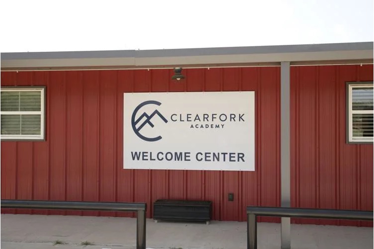 Clearfork Academy Welcome Center sign.