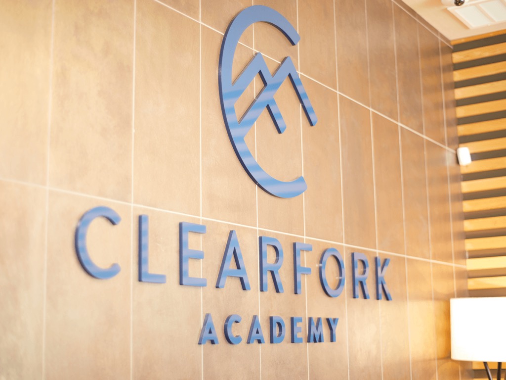 The blue Clearfork Academy logo.