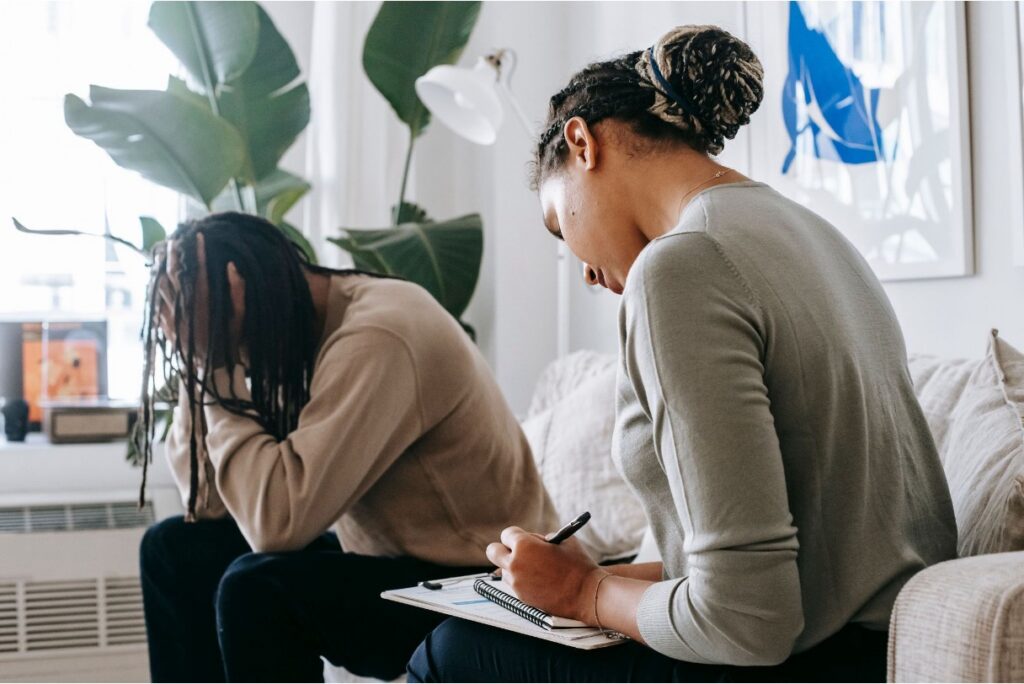 A teen undergoing a session with a therapist