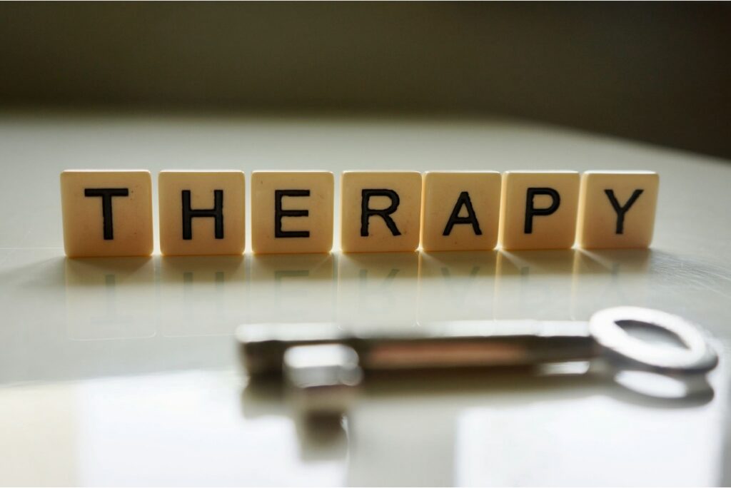 “Therapy” spelled out with individual tiled letters