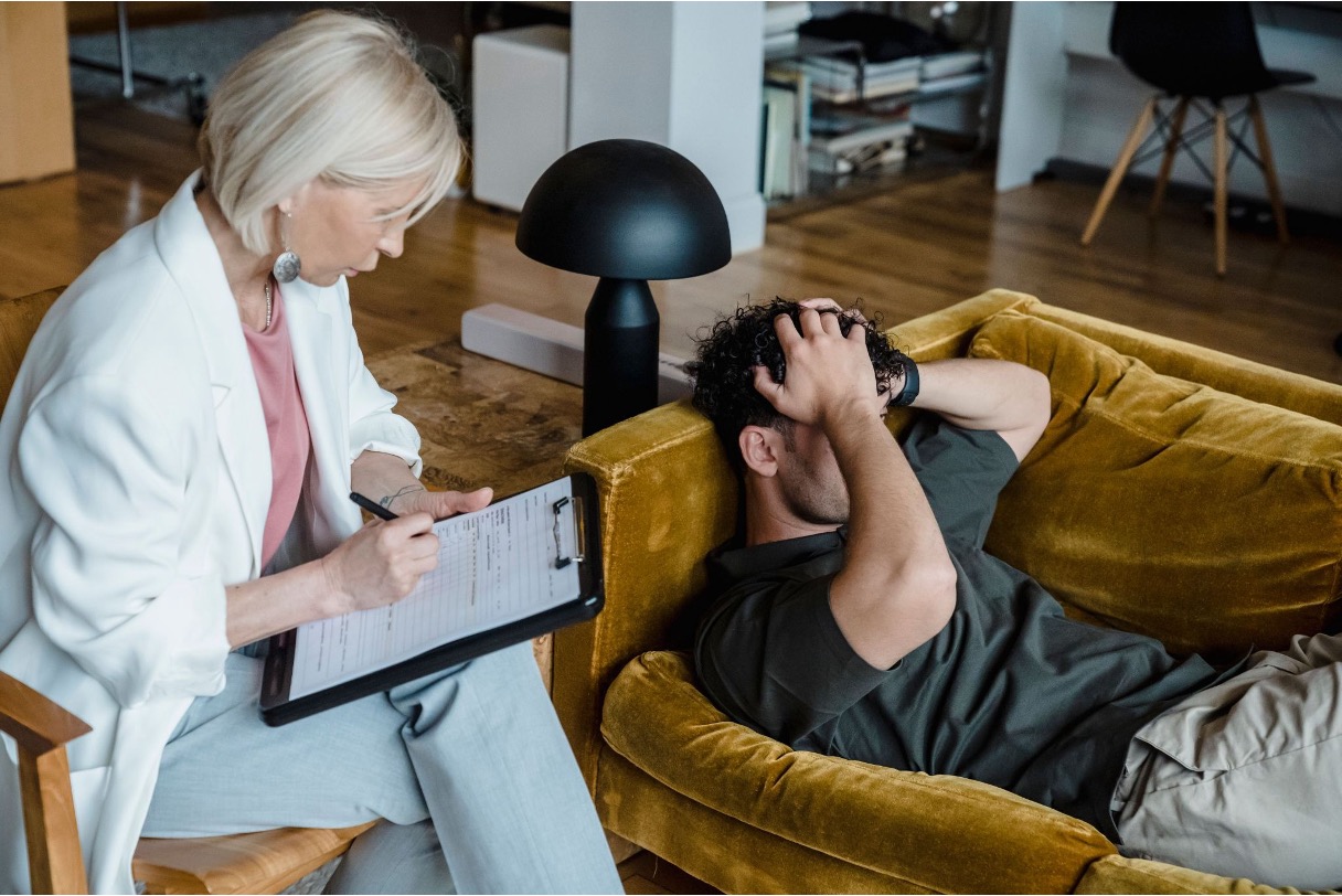 Therapist and a client having a session in a cozy setup