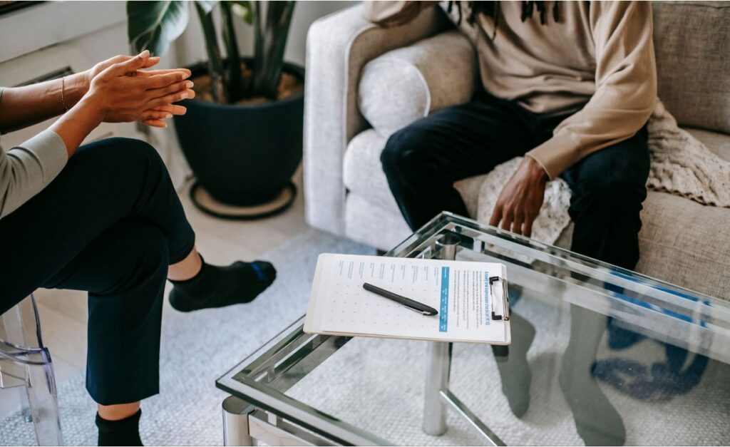 Therapy session between a psychologist and a teenager 